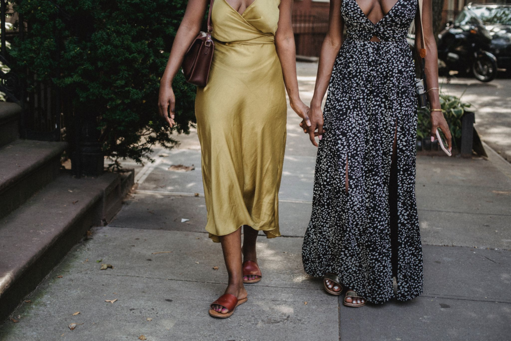 2 woman wearing picture perfect dresses to attend a destination wedding
